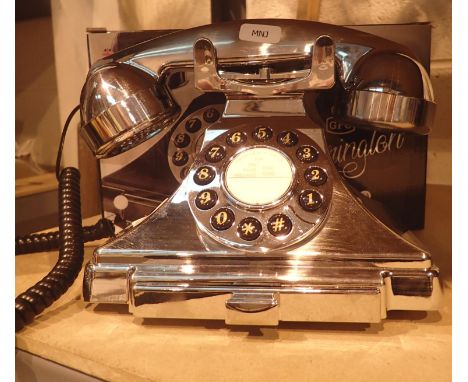 Chrome, GPO Carrington, push button telephone in 1920s styling with pull-out pad tray; compatible with modern telephone banki
