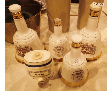 Four Wade Bells decanters and a Wade Gin ceramic barrel. Not available for in-house P&amp;P, contact Paul O'Hea at Mailboxes 