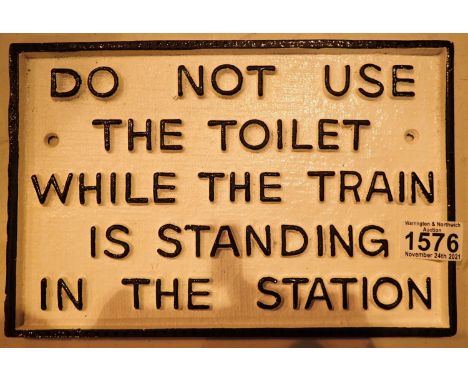 Cast iron Do Not Use The Toilet When The Train Is Standing At Station sign, L: 29 cm. P&amp;P Group 1 (£14+VAT for the first 