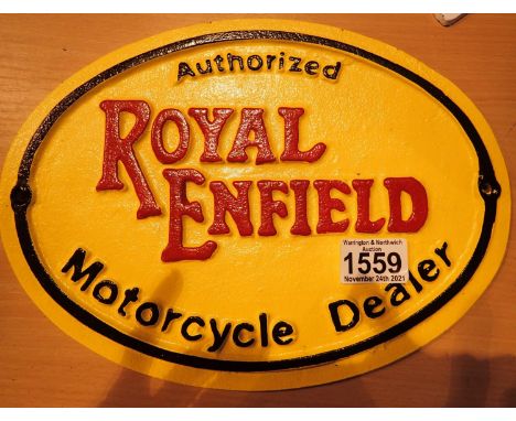 Cast iron Royal Enfield motorcycle dealer shop sign, L : 29 cm. P&amp;P Group 1 (£14+VAT for the first lot and £1+VAT for sub