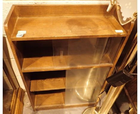 Vintage three shelf mahogany bookcase with glass sliding drawers, H: 93 cm. Not available for in-house P&amp;P, contact Paul 