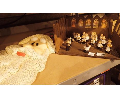 Seventeen ceramic Christmas Choir figurines and a plaster Father Christmas wall plaque. Not available for in-house P&amp;P, c