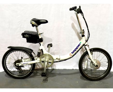 Hopper 24v electric foldaway bike with peddle assist, requires charger. Key in office (8197). Not available for in-house P&am