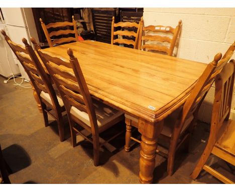 Set of six beech ladder back chairs with upholstered seats and matching oak table, L: 185 cm. Not available for in-house P&am