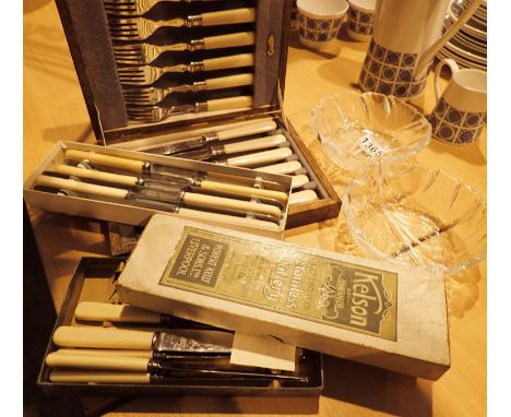 Three boxed sets of stainless steel cutlery and a pair of Orrefors glass bowls. Not available for in-house P&amp;P, contact P