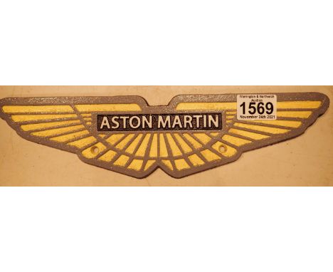 Cast iron Aston Martin wins shop sign, L: 34 cm. P&amp;P Group 1 (£14+VAT for the first lot and £1+VAT for subsequent lots) 