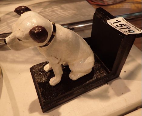 Cast iron sitting dog doorstopper, H: 12 cm. P&amp;P Group 1 (£14+VAT for the first lot and £1+VAT for subsequent lots) 