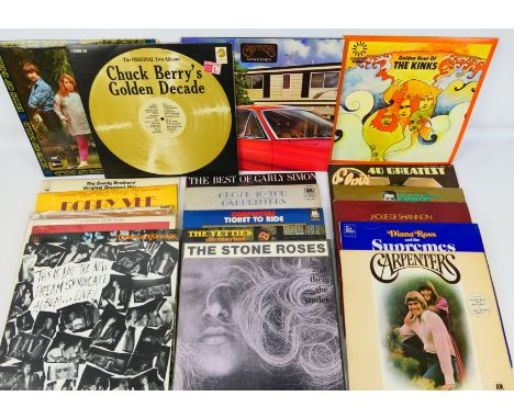 A collection of 12" vinyl records to include The Carpenters, The Kinks, The Stone Roses Fools Gold 9.53 (gold vinyl) 1315-1-J