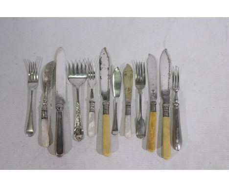 A silver bladed fish knife, silver handled knife, silver fork, and a small collection of silver plated cutlery. Various date 