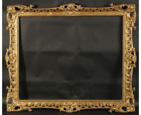 A CHIPPENDALE GILTWOOD PICTURE FRAME Rebate size 27ins x 22ins