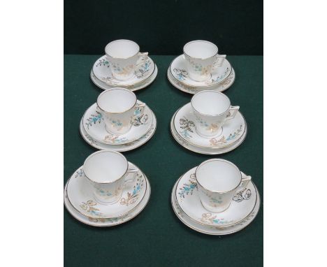 SET OF SIX PAINTED AND GILDED VICTORIAN CERAMIC TRIOS 