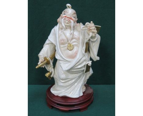 GILDED CERAMIC ORIENTAL STYLE FIGURE ON WOODEN STAND, APPROXIMATELY 40cm HIGH 
