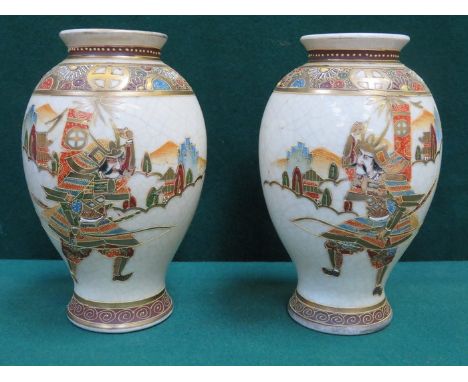PAIR OF HANDPAINTED AND GILDED CERAMIC VASES DECORATE WITH ORIENTAL WARRIORS, APPROXIMATELY 19cm HIGH 