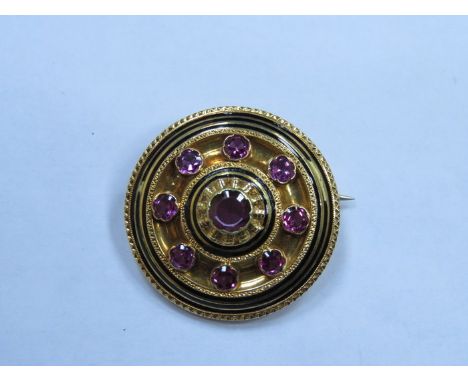 VICTORIAN GOLD ENAMELLED CIRCULAR BROOCH SET WITH NINE AMETHYST STONES 