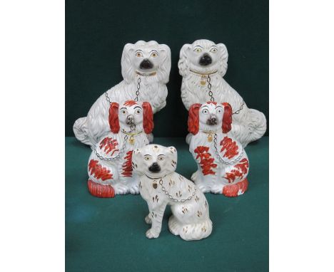 FIVE VARIOUS STAFFORDSHIRE STYLE CERAMIC SPANIELS 