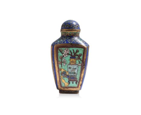 A GILT CLOISONNE SNUFF BOTTLE
Shaped form with short waisted neck and wide mouth, blue ground decorated in gilt, copper and c