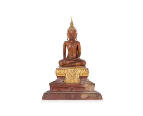 A THAI CARVED WOOD FIGURE OF SEATED BUDDHA
Ayutthaya style 18th/19th century, probably sandalwood, modelled seated in 'Sattva