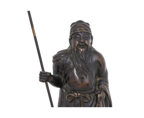 A BRONZE MODEL OF KANTEI (GUANDI) STANDING
Japanese, late Edo/Meiji period, modelled with long unruly beard, wearing robe wit