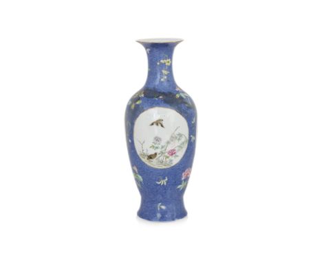 A BLUE GROUND SGRAFFITO VASE
Slender baluster form porcelain vase, panelled decoration of cat looking up at bird among flower