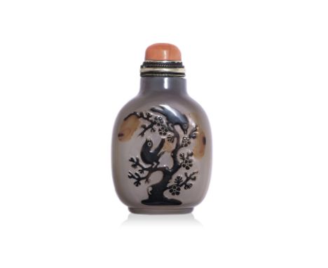 A PICTORIAL SILHOUETTE AGATE 'BIRDS AND PLUM BLOSSOM' SNUFF BOTTLE
19th Century, brown, grey and orange tones, compressed ovo