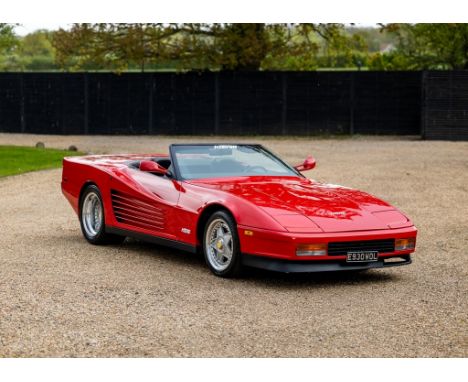 This Evocation Corvette C4 convertible is presented in red coachwork with black leather trim. Built to replicate a well-known