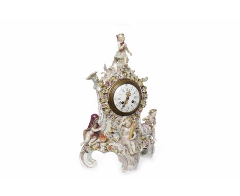 LATE 19TH CENTURY CONTINENTAL FLORAL ENCRUSTED PORCELAIN MANTEL CLOCKthe white enamel Roman numeral dial with pierced gilt ha