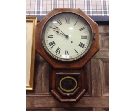 19TH CENTURY AMERICAN DROP DIAL WALL CLOCKoriginally by Seth Thomas, the octagonal shaped hood enclosing a replaced white ena
