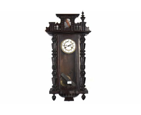 19TH CENTURY VIENNA WALL CLOCKthe outset pediment with prancing horse finial, circular enamel dial below, with Roman numerals