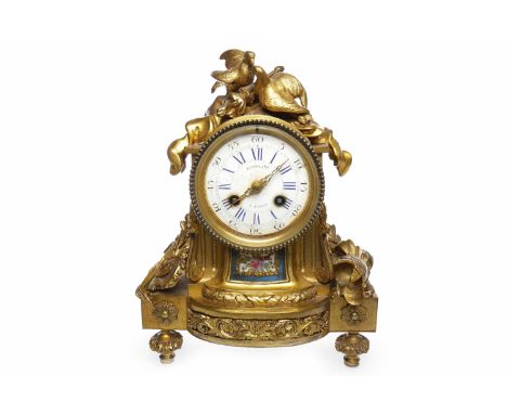 19TH CENTURY GILT METAL MANTEL CLOCKthe movement back plate and face stamped Raingo Freres A Paris, the enamel face with Roma