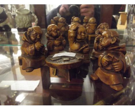 Treen figures in the form of Monks playing cards 