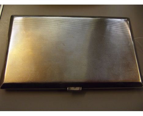 Silver hallmarked engine turned cigarette case, London, weight 202 grams 