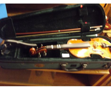 Cased violin and bow