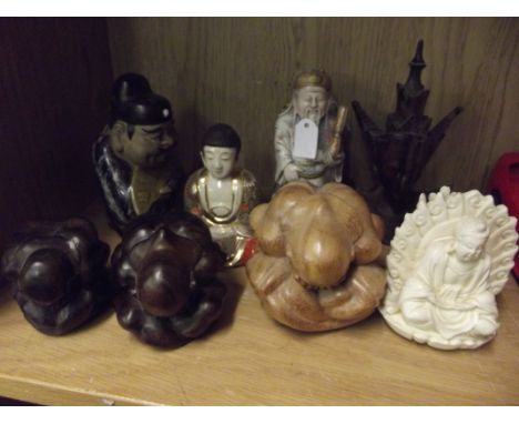 Collection of treen and ceramic Buddhas 