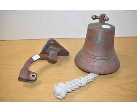 A bronze bell having original wall bracket, inscribed 'Metal Ex H.M.S Rodney Dismantled Inverkeithing, 1949', h17.5cm