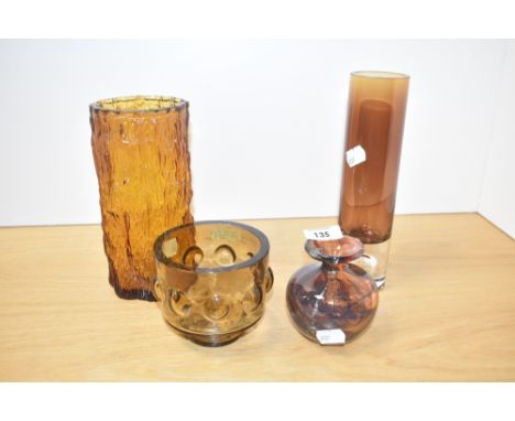 A Ravenhead burnt orange bark vase, h20cm, sold together with a Pukeberg glass candleholder, a Mdina tortoiseshell glass bott
