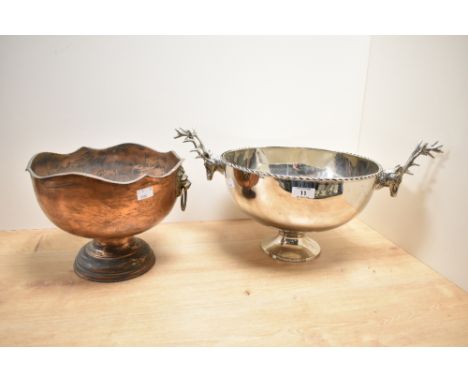 A large white metal wine cooler having stag head handles protruding from the steep bowl form, h19cm, sold together with a cop