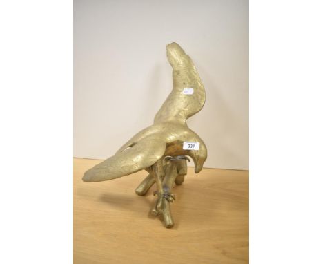 A large vintage brass eagle sculpture perched on a tree branch, wingspan 41cm