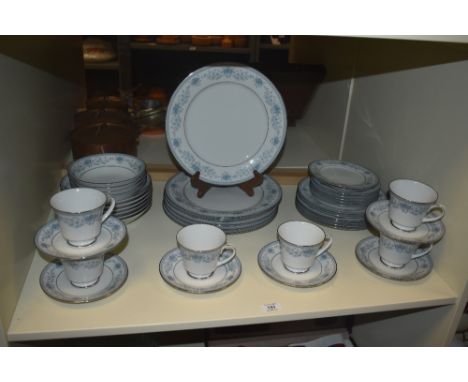 A contemporary fine bone china Noritake Blue Hill pattern tea service decorated with blue foliage on an ice white ground, to 