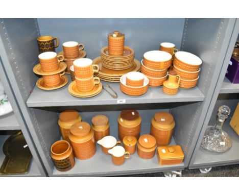 A Hornsea Saffron pattern dinner service decorated having geometrical patterns on an orange/tan ground, to include lidded jar