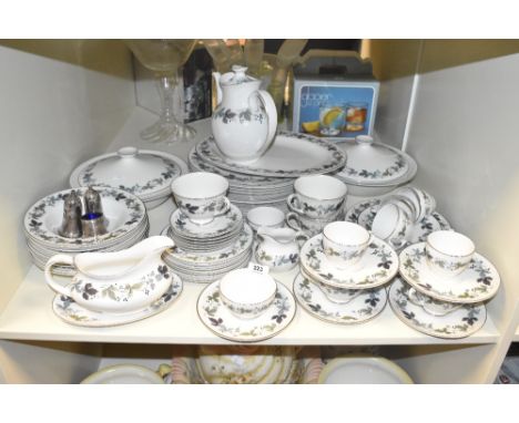 A Royal Doulton 'Burgundy' part dinner/tea service comprising sixty eight pieces approximately including serving platters, tu
