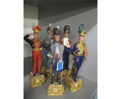 A collection of five Capodimonte ceramic figures modelled as British Military Officers of the early 19th century 