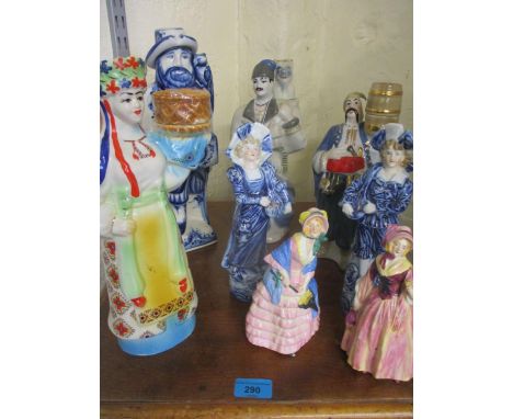 Russian figural ceramic decanters in national costume and other figures 