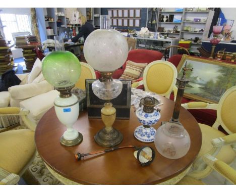 A Hinkess Duplex Victorian opaline glass oil lamp with green and clear Victorian floral etched glass shade, a Meissen style p