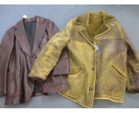 A late 1960s gents light brown leather jacket with faux fur lining, together with a 1970s gents burgundy leather jacket manuf