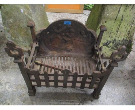 A late 19th/early 20th century cast iron fire grate 