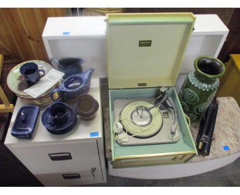 A Dansette record player in a cream and green case, on legs, a West German vase, decorative plates and a tea set 