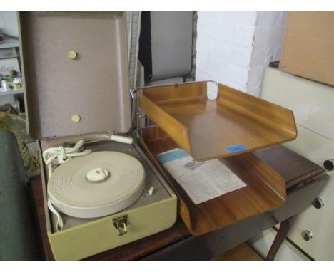 A mid century plywood and chrome desk top filing tray and a Philips Modo de Empleo AG 1964 portable record player 