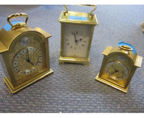 Three modern carriage clocks to include a Bayard 8 day carriage clock 