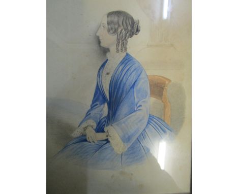 An early 19th century Georgian watercolour portrait of a seated lady, unsigned 8 3/4" x 5 7/8" mounted in a glazed bird's eye
