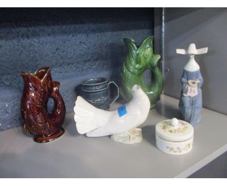 Two items of Lladro, a Holkham pottery tankard and other collectibles 